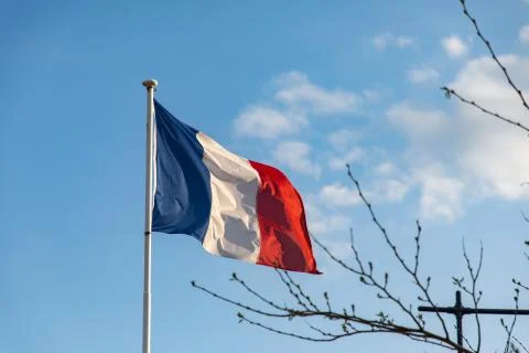French flag waving on the wind Stock Photos