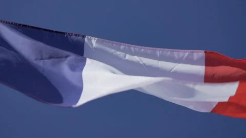 French flag in the wind slow motion shot Stock Footage 95937625