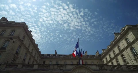 French flags on a building next to Orsay Museum, Paris, France stock footage Stock Footage 200396252