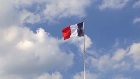 French flags waving in the wind in Paris France on the Bastille Day Stock Footage 105521430