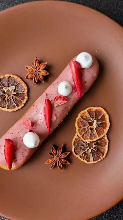French food, dessert eclair with chocolate filling. Eclair as a background Stock Footage 310882906