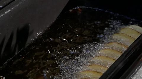 French fries in the form of deep-fried chips Stock Footage 115708799