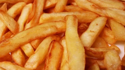 French fries rotating texture pattern closeup footage Video stock 97230650