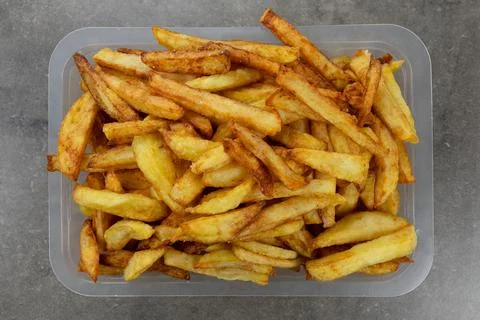 French fries on a table Stock Photos