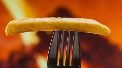 French fry on a fork disappear bite by bite - stop motion animation Video stock 107028016