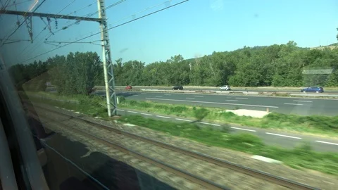 French highway filmed from a train going faster Stock Footage