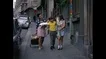 French Housewife In Pleated Miniskirt Returns Home From The Market , Paris, 1970 Stock Footage
