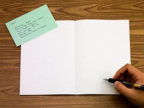 French; Learning New Language Writing Words on the Notebook Stock Photos
