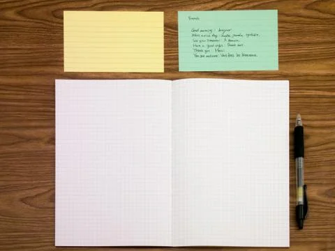 French; Learning New Language Writing Words on the Notebook Stock Photos