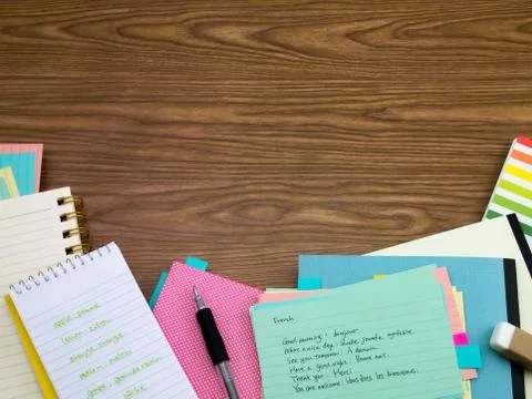 French; Learning New Language Writing Words on the Notebook Stock Photos