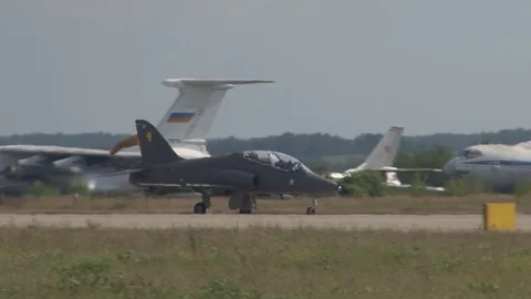French light jet aircraft Alpha Jet moves on runway. Stock Footage 117541454