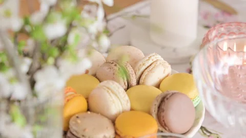 French macarons on a beautifully served table. Macaroons dessert close-up. Stock Footage 272817387