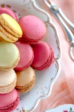 French macarons over head pretty colours in selective focus for text Fotos Stock