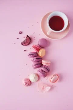 French macarons on pink background. Stock Photos