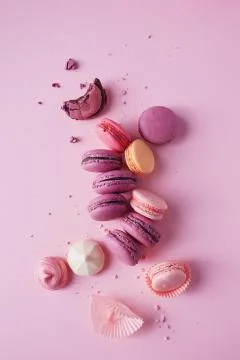 French macarons on pink background. Stock Photos