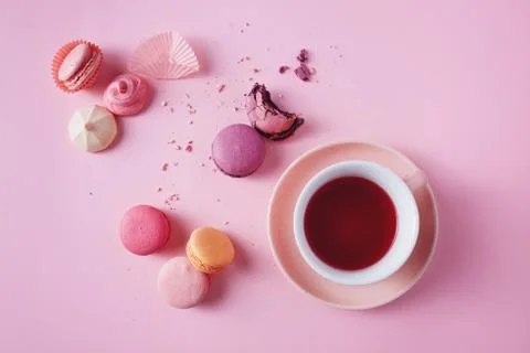 French macarons on pink background. Stock Photos