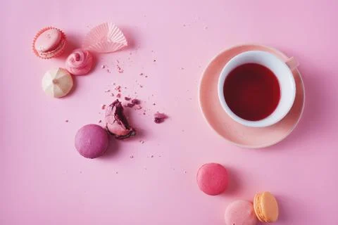 French macarons on pink background. Stock Photos