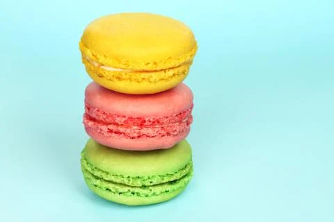 French macaroons on blue background Stock Photos