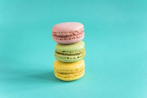 French macaroons on a blue background Stock Photos