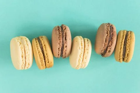 French macaroons on a blue background Stock Photos