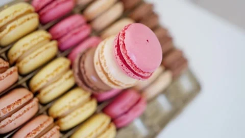 French macaroons cakes slowly move in the frame. Great food background for your Stock Footage 306881691