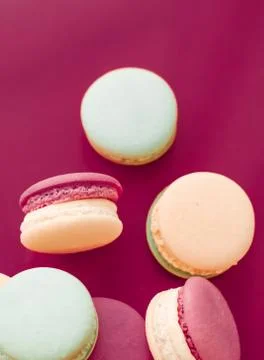 French macaroons on cherry pink background, parisian chic cafe dessert, sweet 写真素材