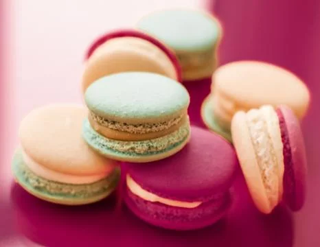 French macaroons on cherry pink background, parisian chic cafe dessert, sweet Stock Photos