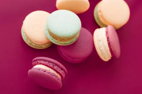 French macaroons on cherry pink background, parisian chic cafe dessert, sweet 写真素材