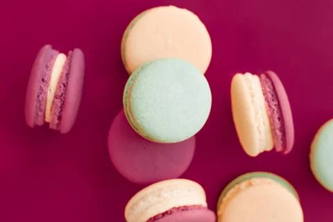 French macaroons on cherry pink background, parisian chic cafe dessert, sweet Stockfoto's
