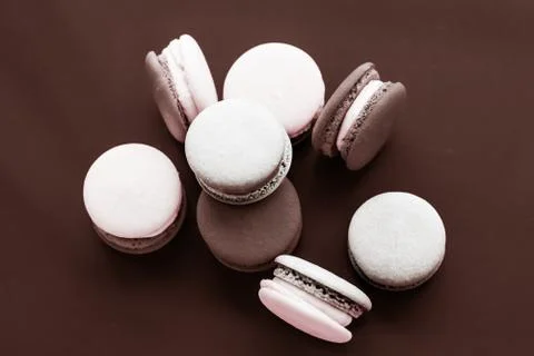 French macaroons on milk chocolate background, parisian chic cafe dessert, sw 写真素材