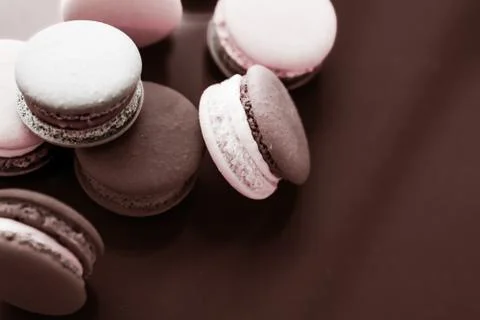 French macaroons on milk chocolate background, parisian chic cafe dessert, sw 写真素材