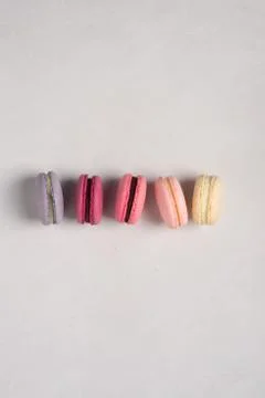 French macaroons on white background. Copy space. Stock Photos