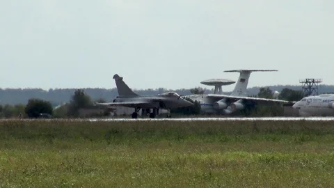 French multi-role fighter Dassault Rafale moves along runway toward parking lot. Stock Footage 120682163