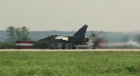 French multi-role fighter Dassault Mirage 2000 accelerates and takes off. Stock Footage 172192010