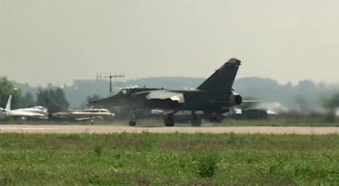 French multirole jet fighter Dassault Mirage 2000 stands on runway. Stock Footage 182924113