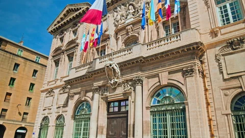 French old building with flags in Marseille. Stock Footage 247215421