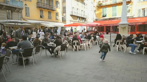 French outdoor cafe scene on a typical summer afternoon Stock Footage 33731314