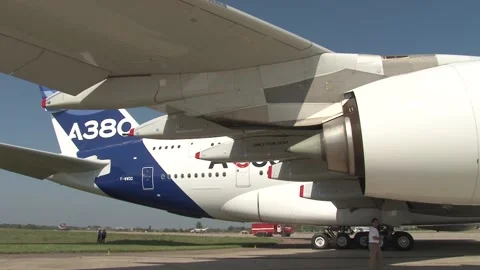 French passenger four-engine wide-body aircraft Airbus A-380 at parking lot. 動画素材 201999228