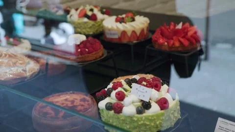 French pastries in bakery window in Paris Stock Footage 246641847