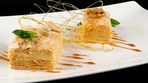 French pastry, Vanilla slice cake or Mille-feuille, served in luxury restaurant 動画素材 90658596