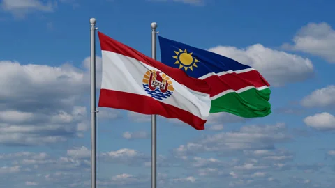 French Polynesia and Namibia waving flags Stock Footage 288390666