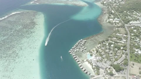 French Polynesia Boats driving in front of Manava Moorea Stock Footage 168724531