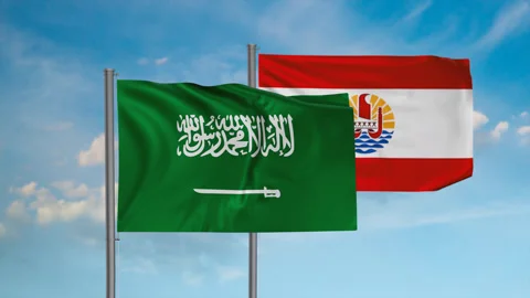 French Polynesia flag and Saudi Arabia flag waving together on blue sky, looped Stock Footage 244063049