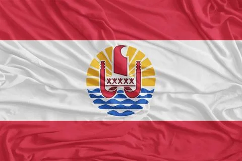 French Polynesia Flag Waves Closeup In Breeze Foto stock