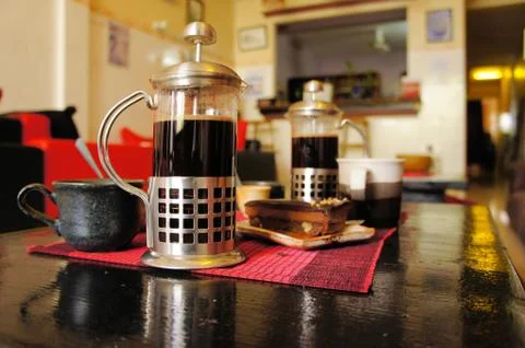 French press coffee maker with cup Fotos Stock