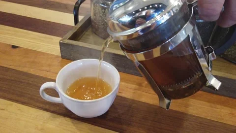 French Press Hot Tea poured into cup Vidéo 227009845