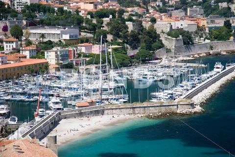 French Riviera lagoon with luxury yachts Stock Photos