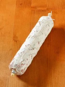 French Saucisson Sec on cutting board Stock Photos