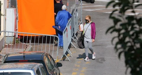 French Shoppers Are Lining Up To Enter Grocery Store Stock Footage 127789236
