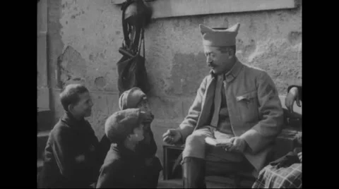 French soldier talking with French boys Stock Footage